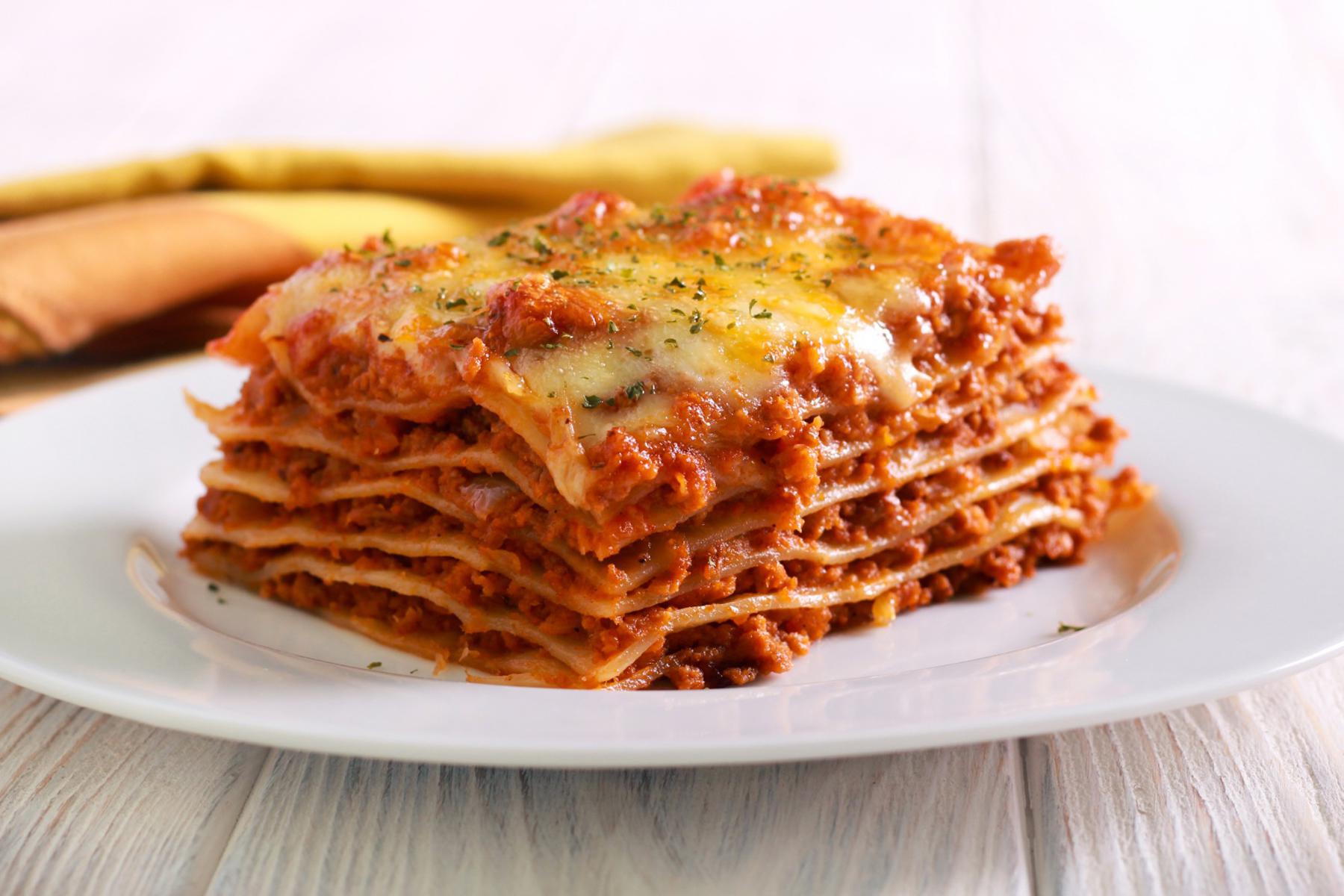 Lasagna on white plate.