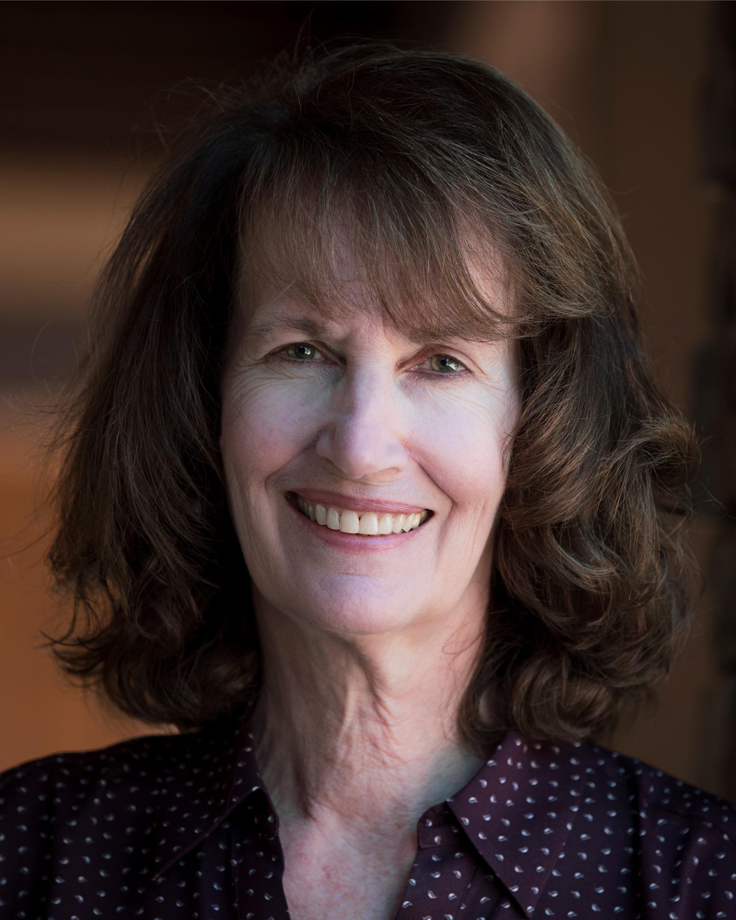 A headshot of Karen McIntyre