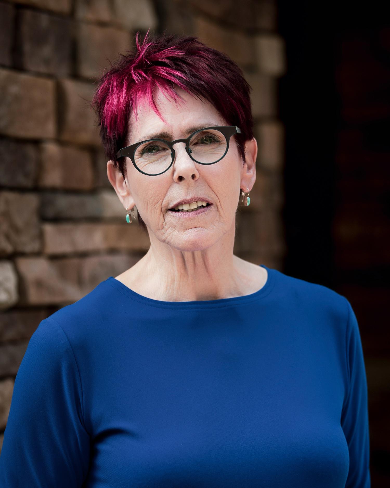 A headshot of Tryshe Dhevney
