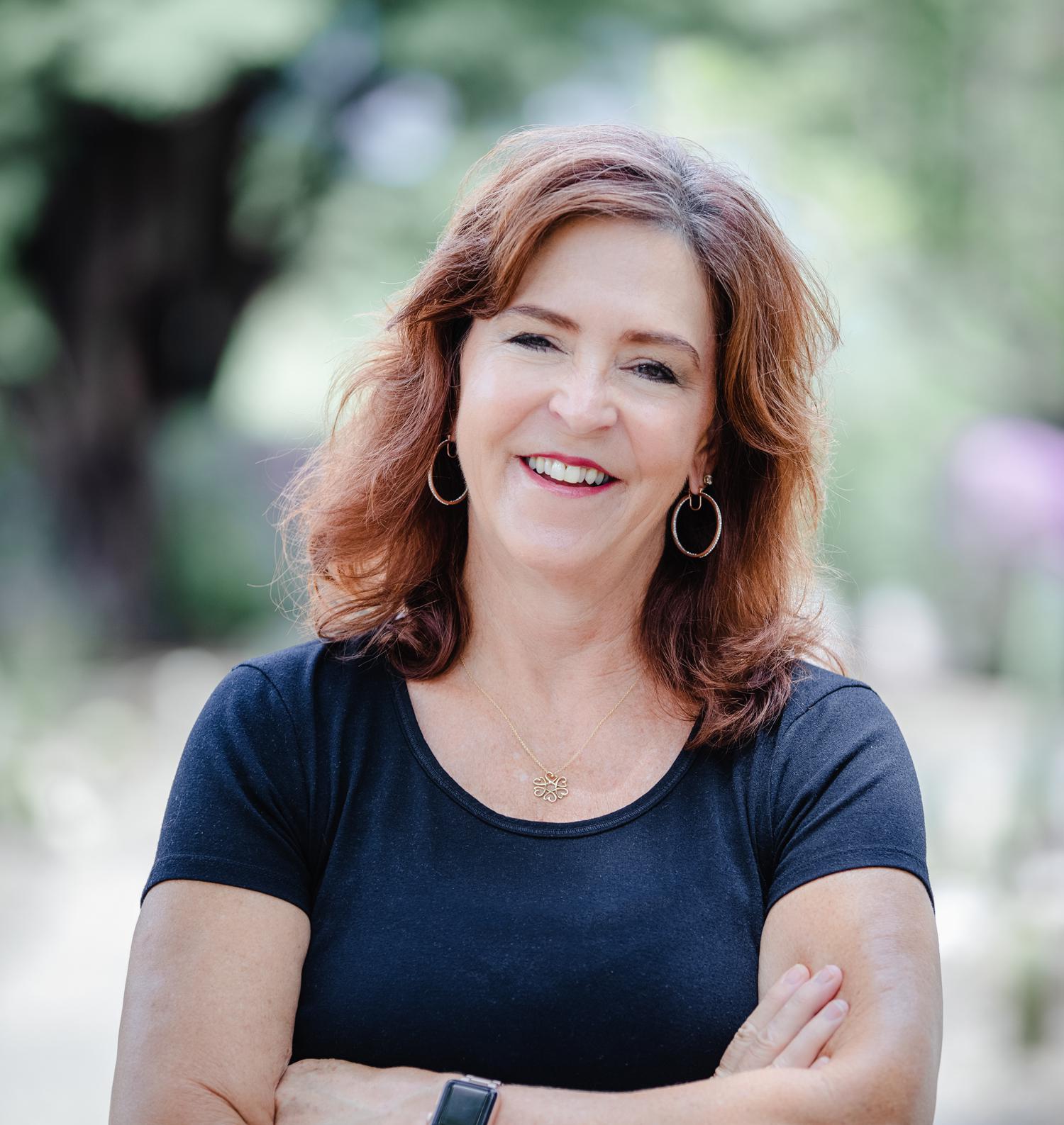 A headshot of Kim Nixon.