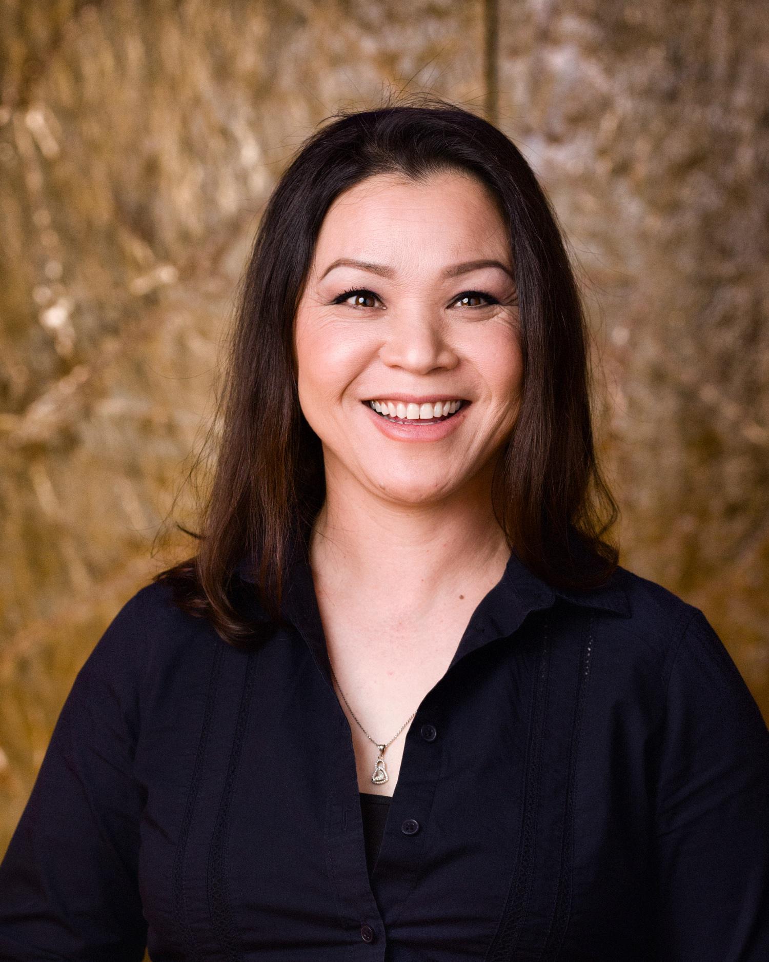A headshot of Kimmie Nguyen