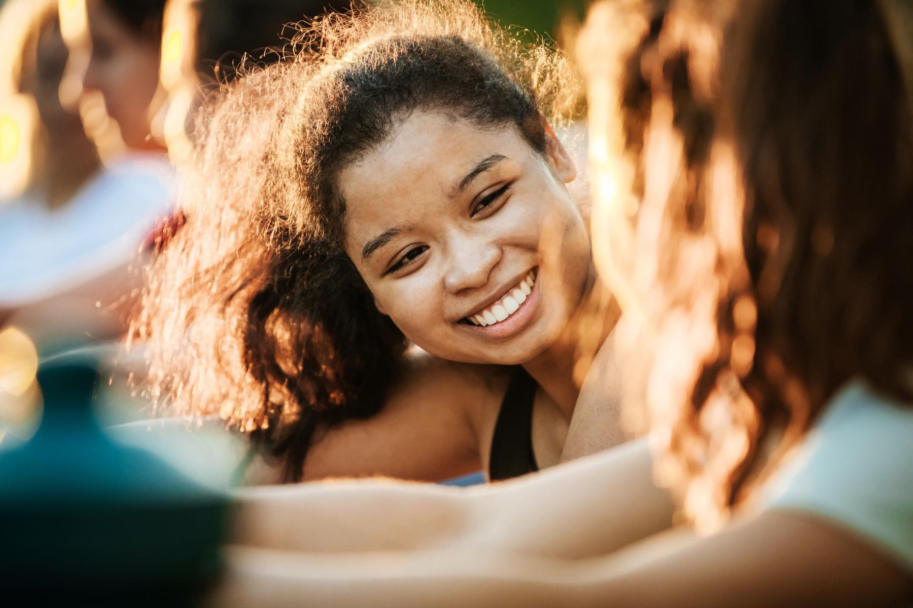 Close-up of woman smiling.