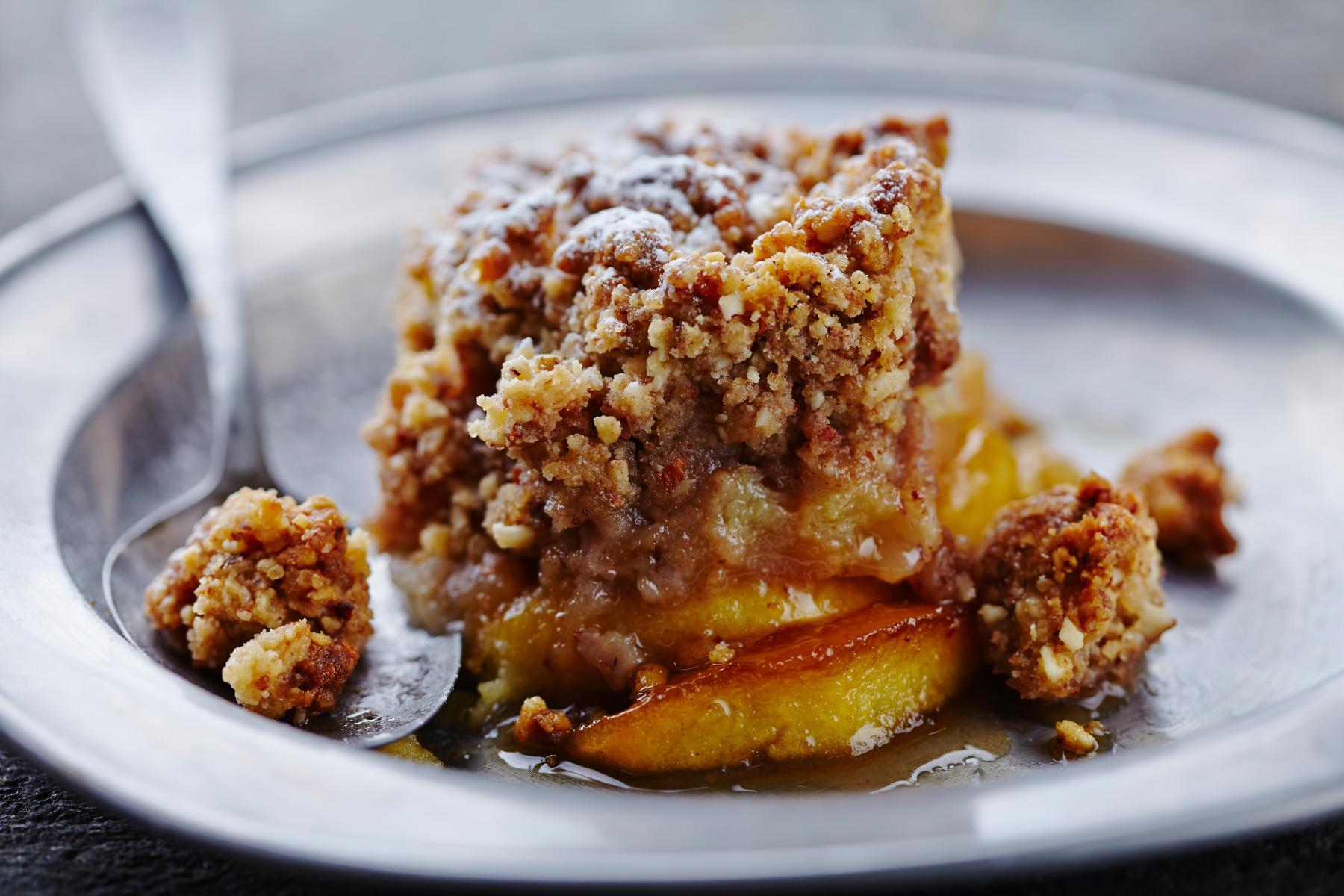 Close-up of a serving of apple raisin crisp.