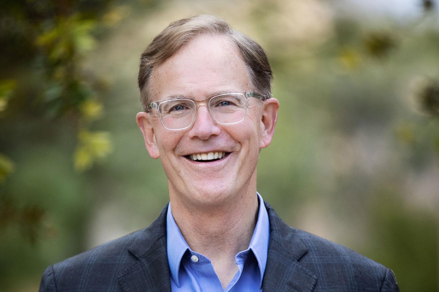 A headshot of Dr. Stephen Brewer
