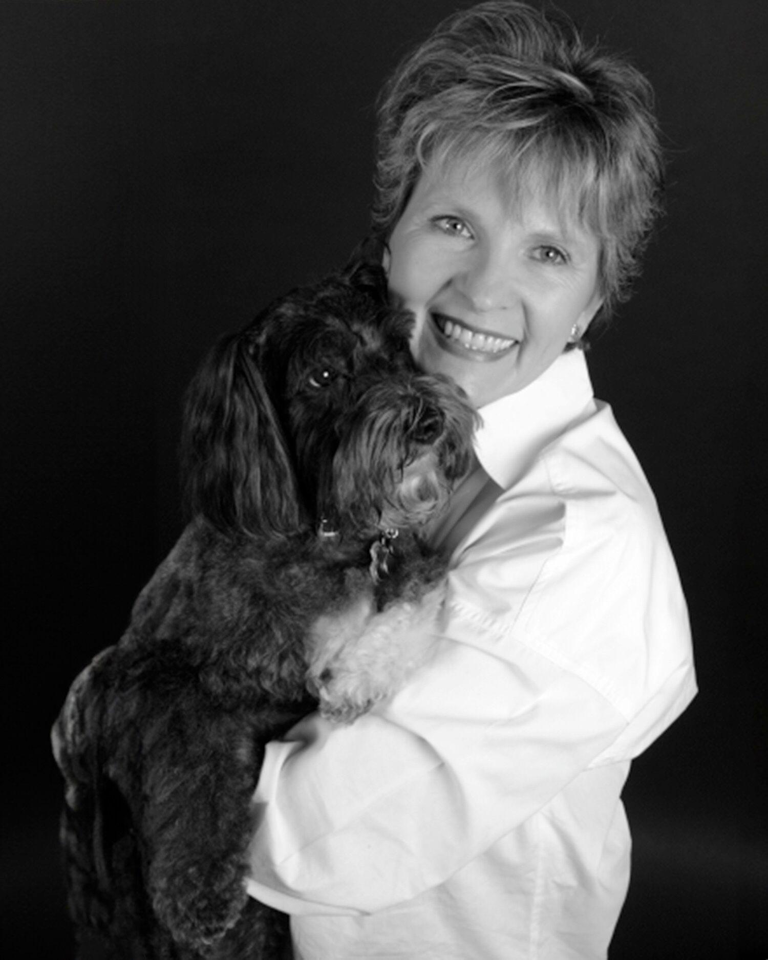 Headshot of Diane Roadcap and her dog