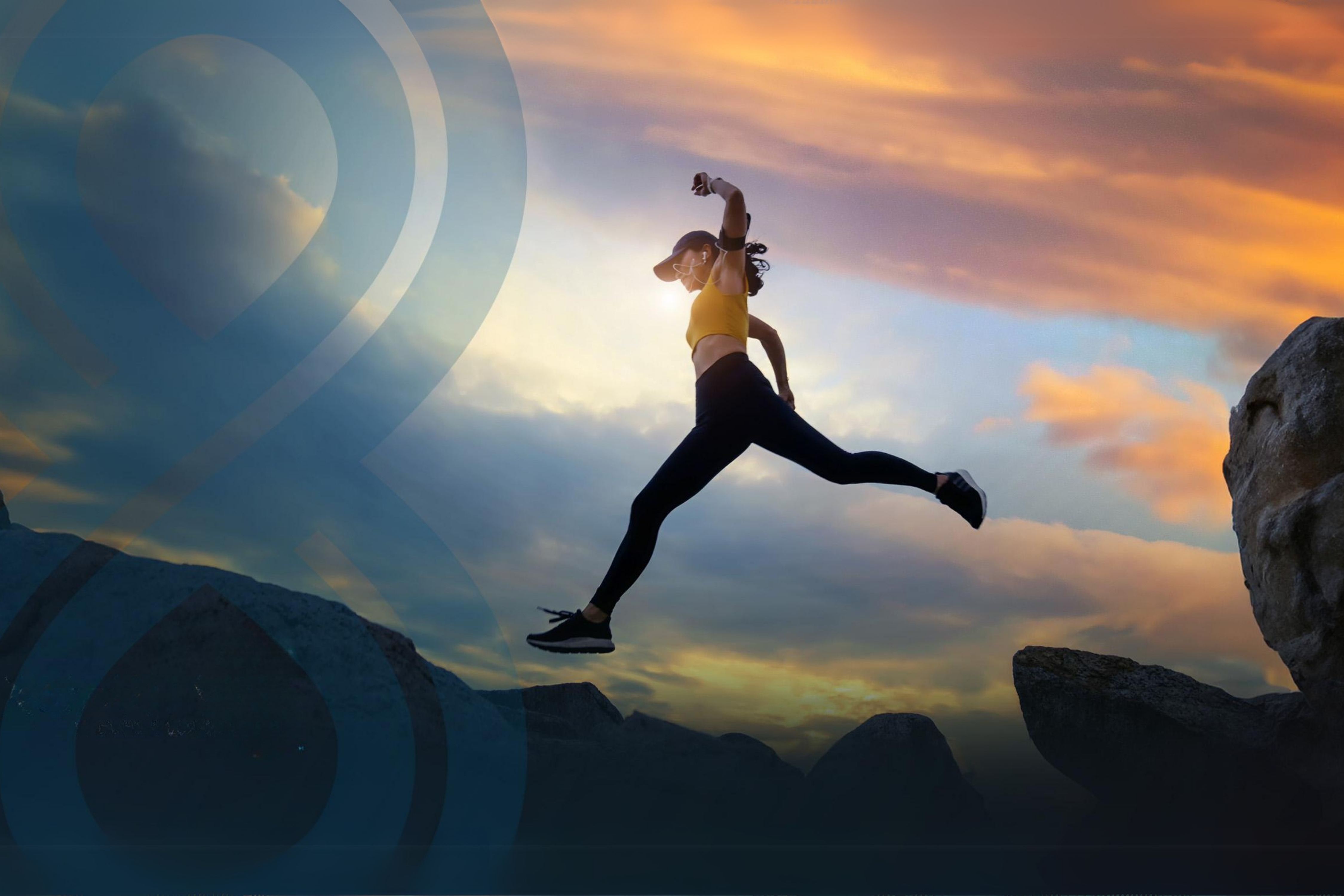 A woman leaping on boulders