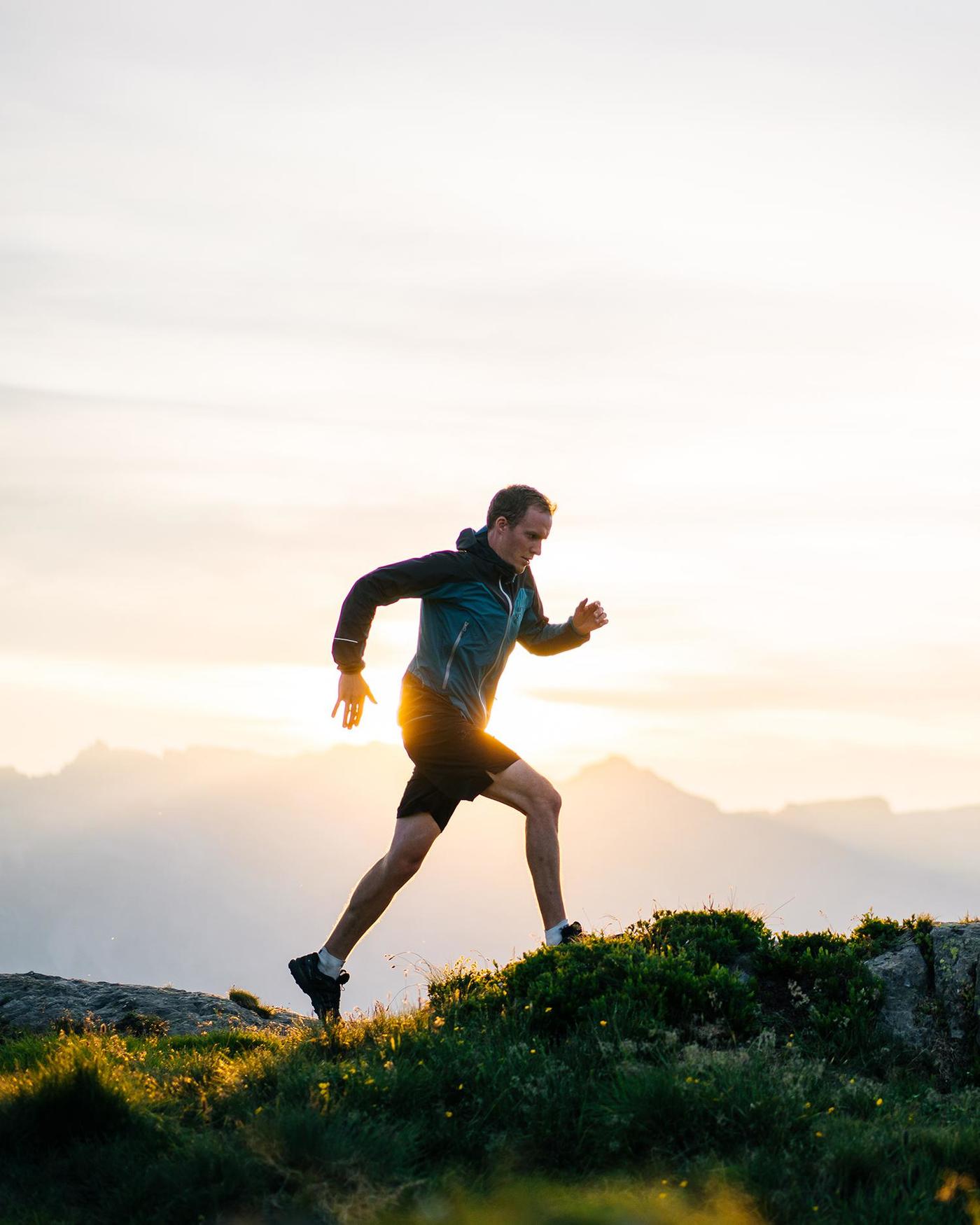 A man running on a hill top