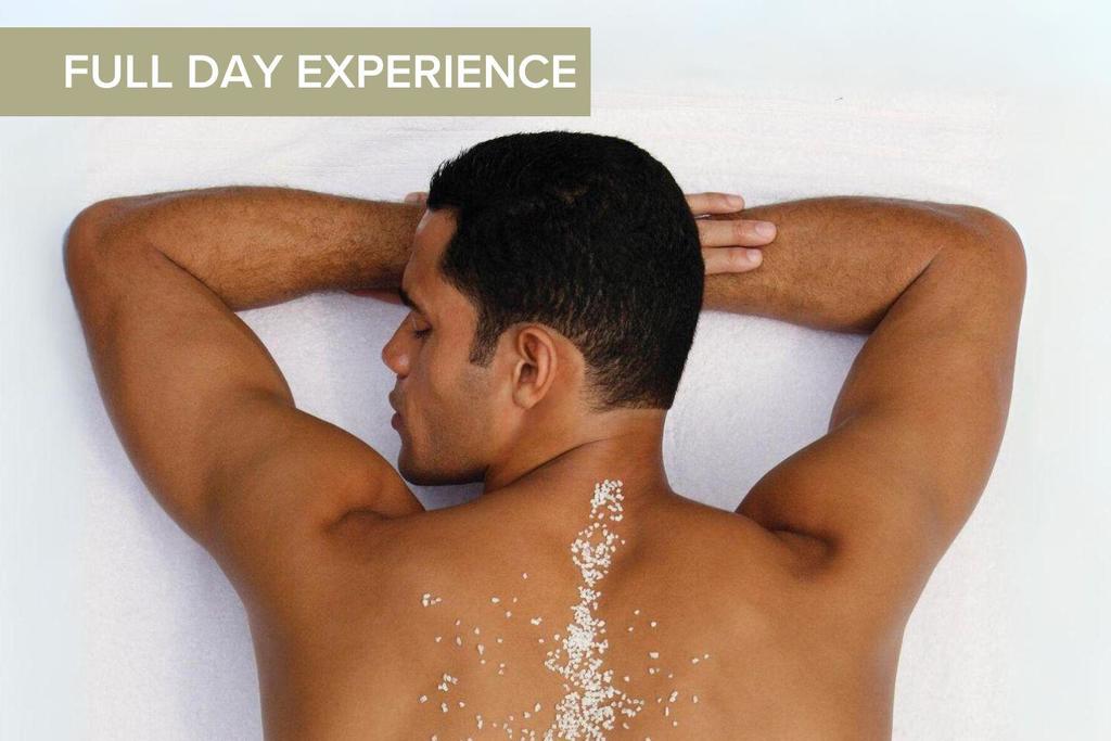 A man getting a salt scrub body treatment at Canyon Ranch Fort Worth Spa