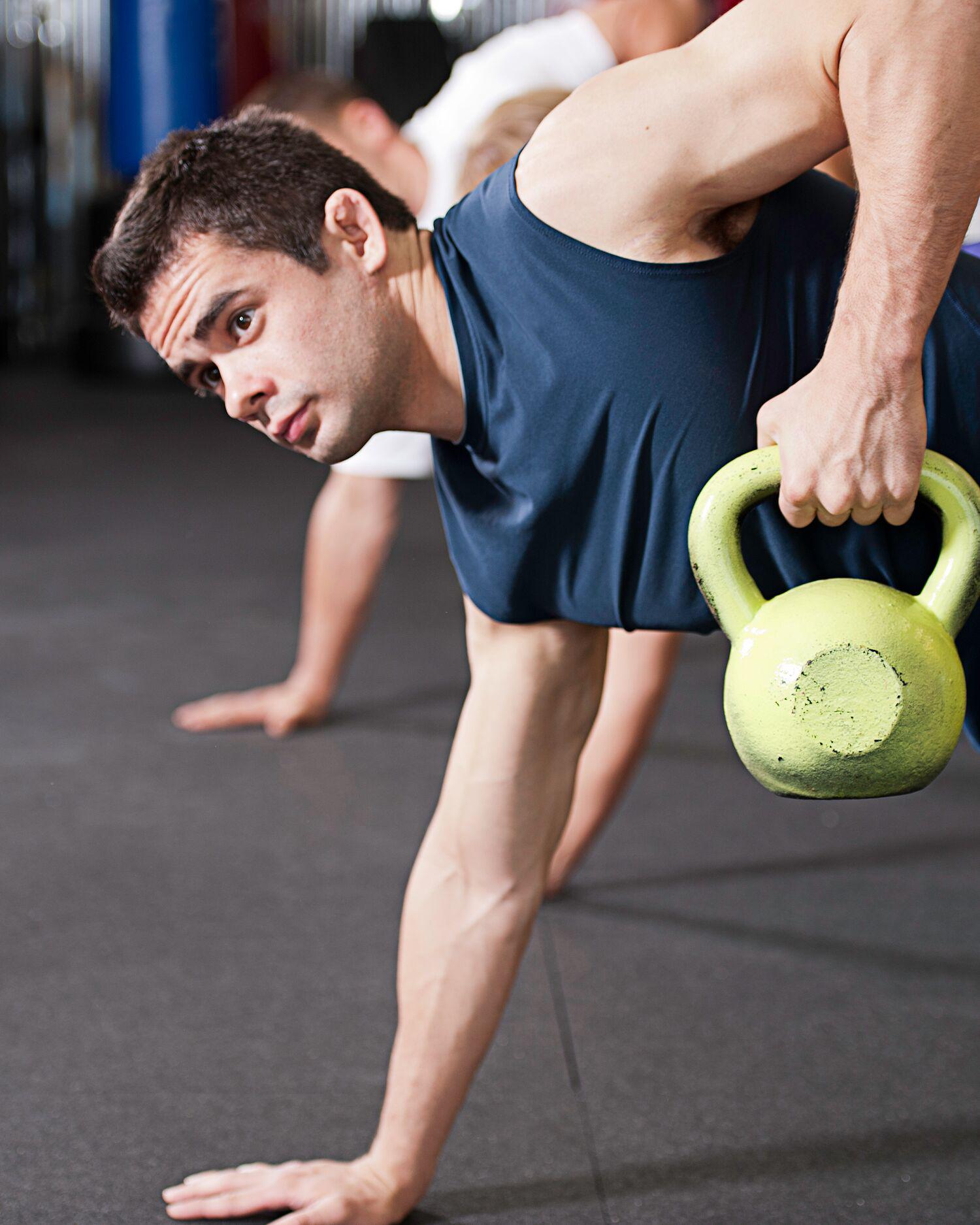 A group of men lifting kettlebells at the Fitness Center at Canyon Ranch Lenox Health Spa Resort
