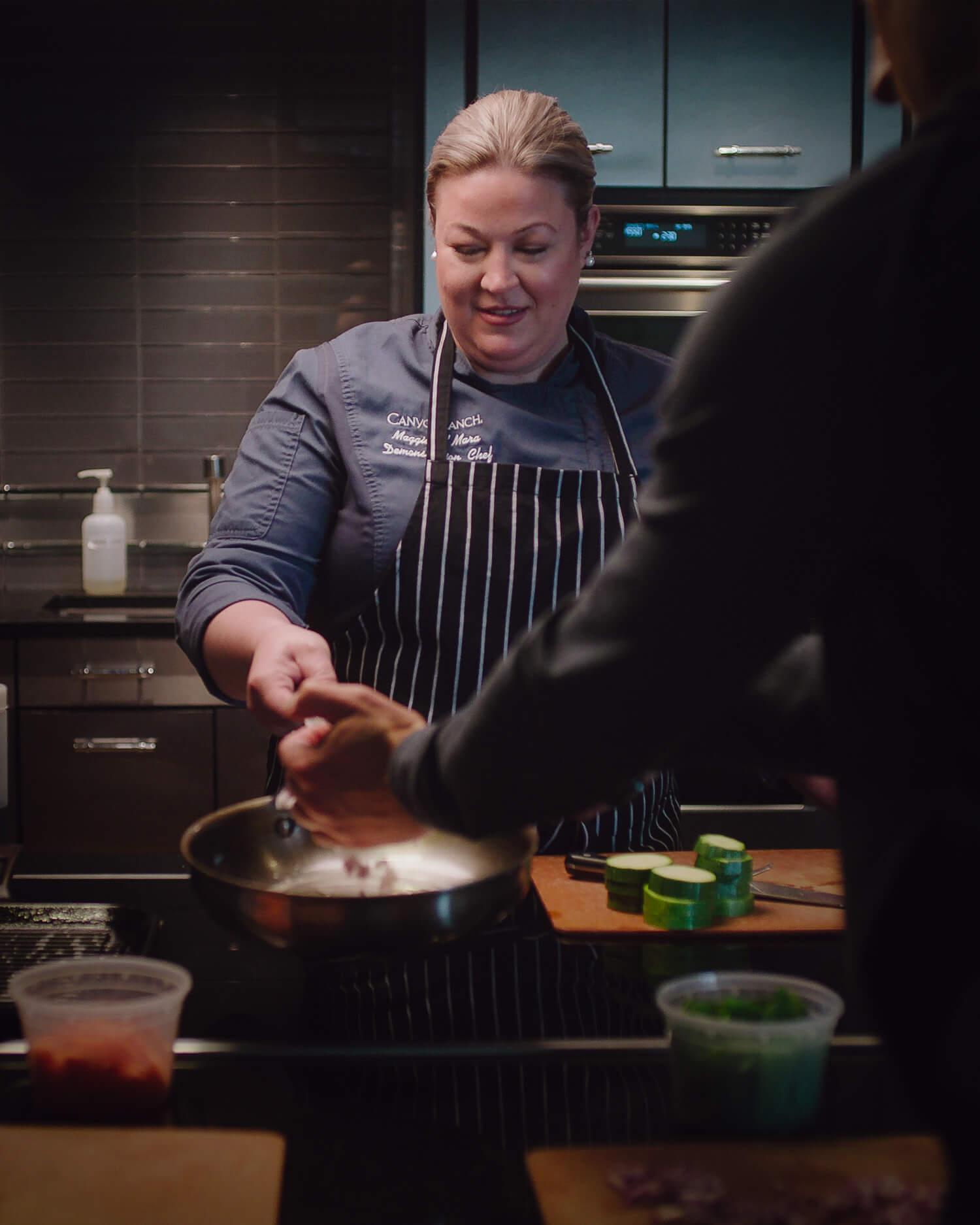Close-up of cooking in demo kitchen.