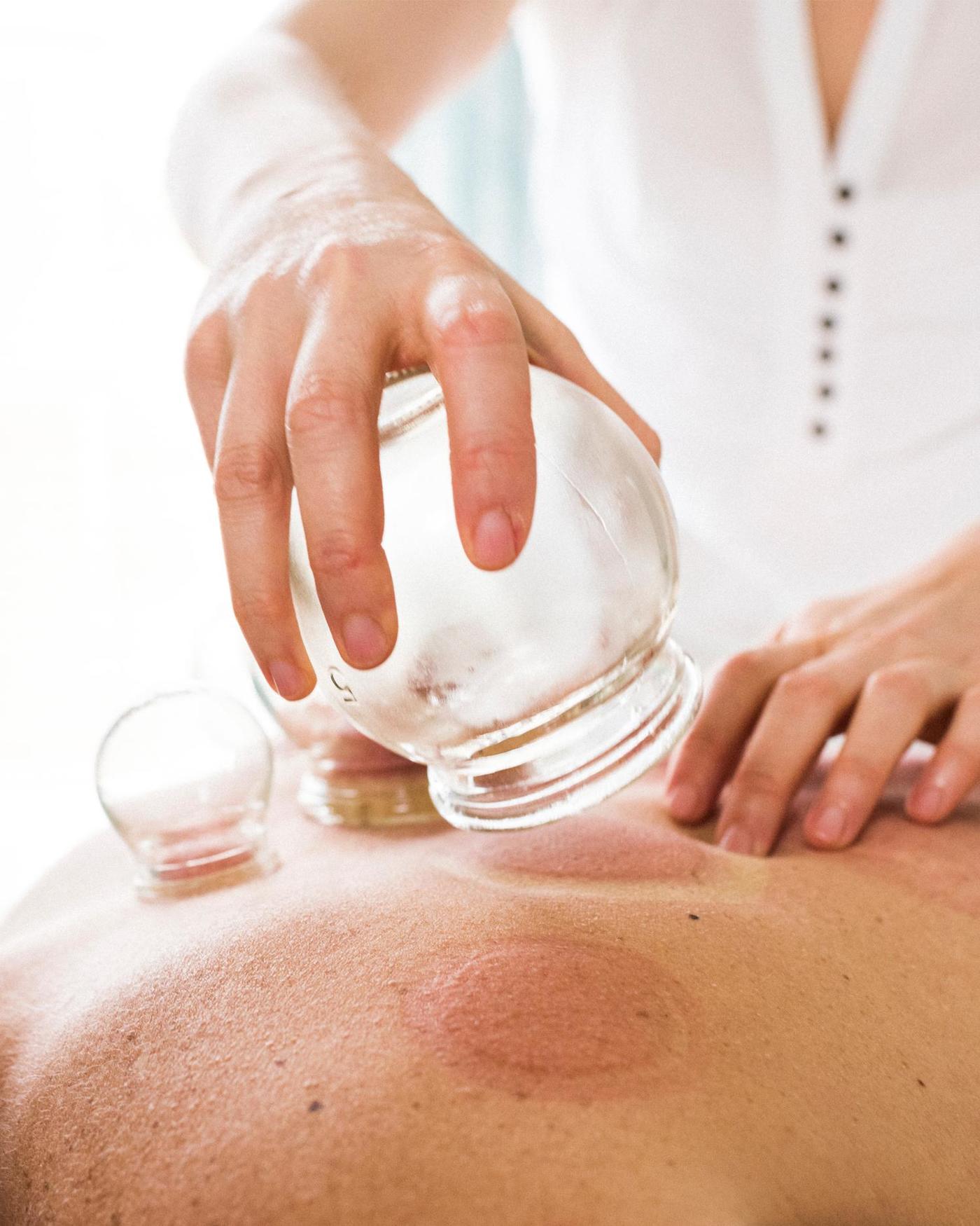 a woman getting a cupping sports massage at Canyon Ranch Tucson health spa resort