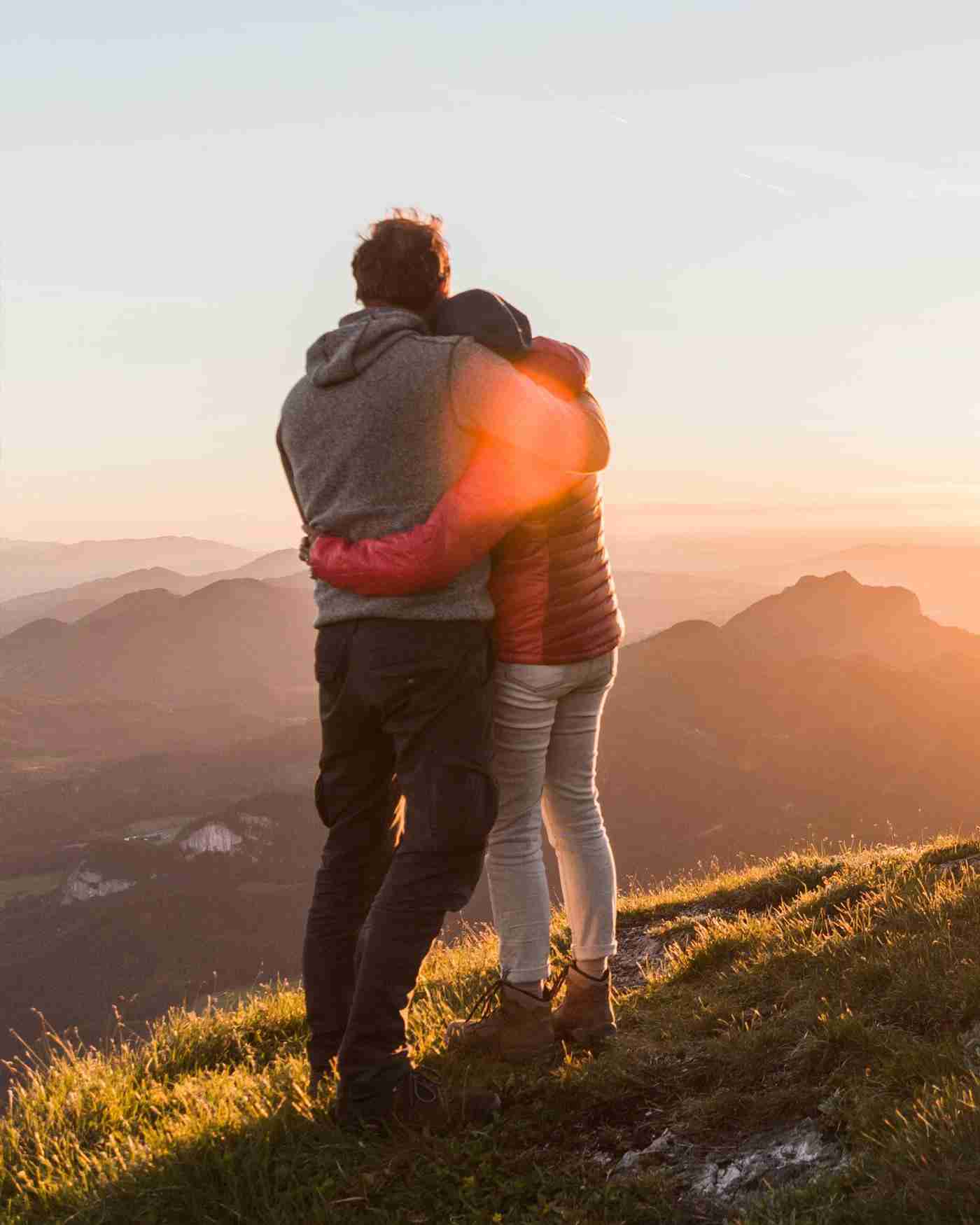 A couple overlooking a mountain 