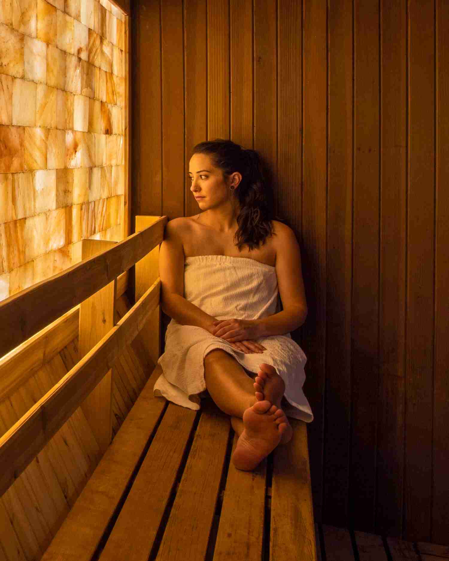 A woman sitting in a salt sauna