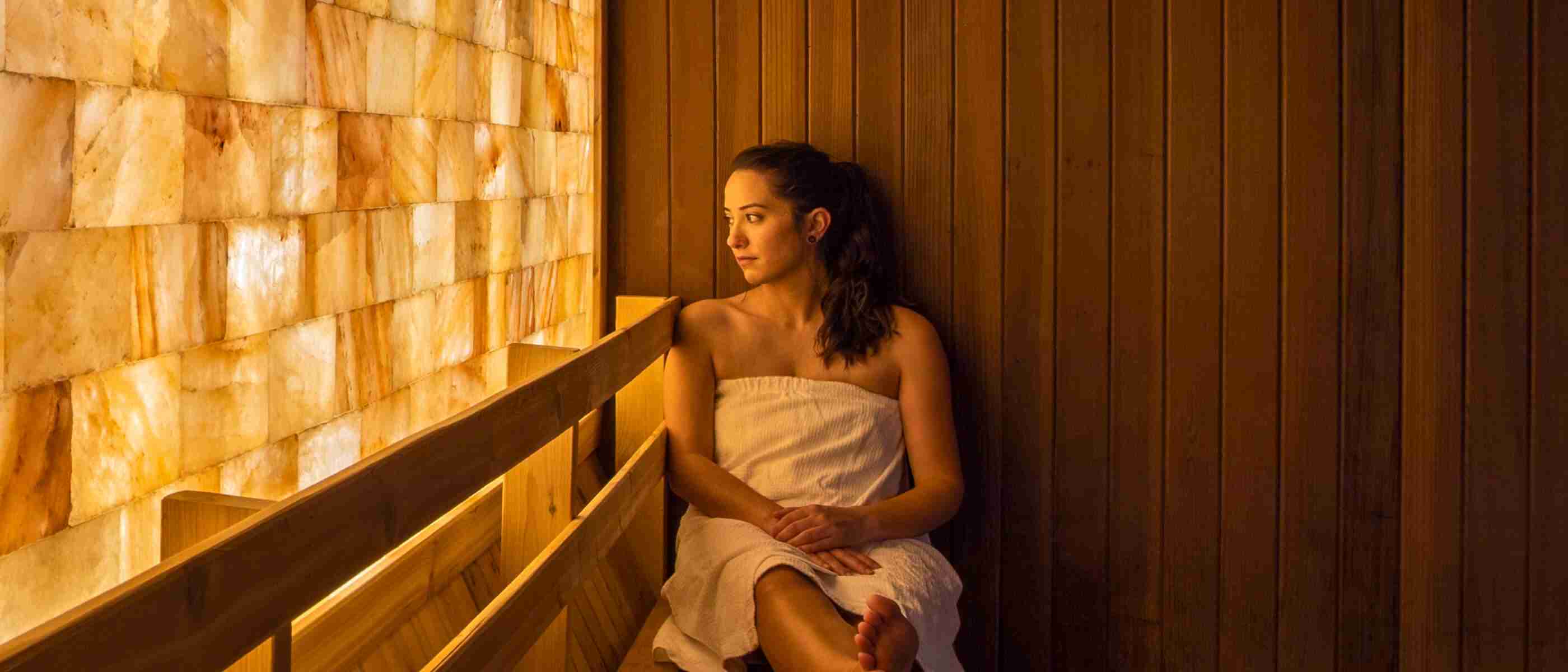A woman sitting in a salt sauna