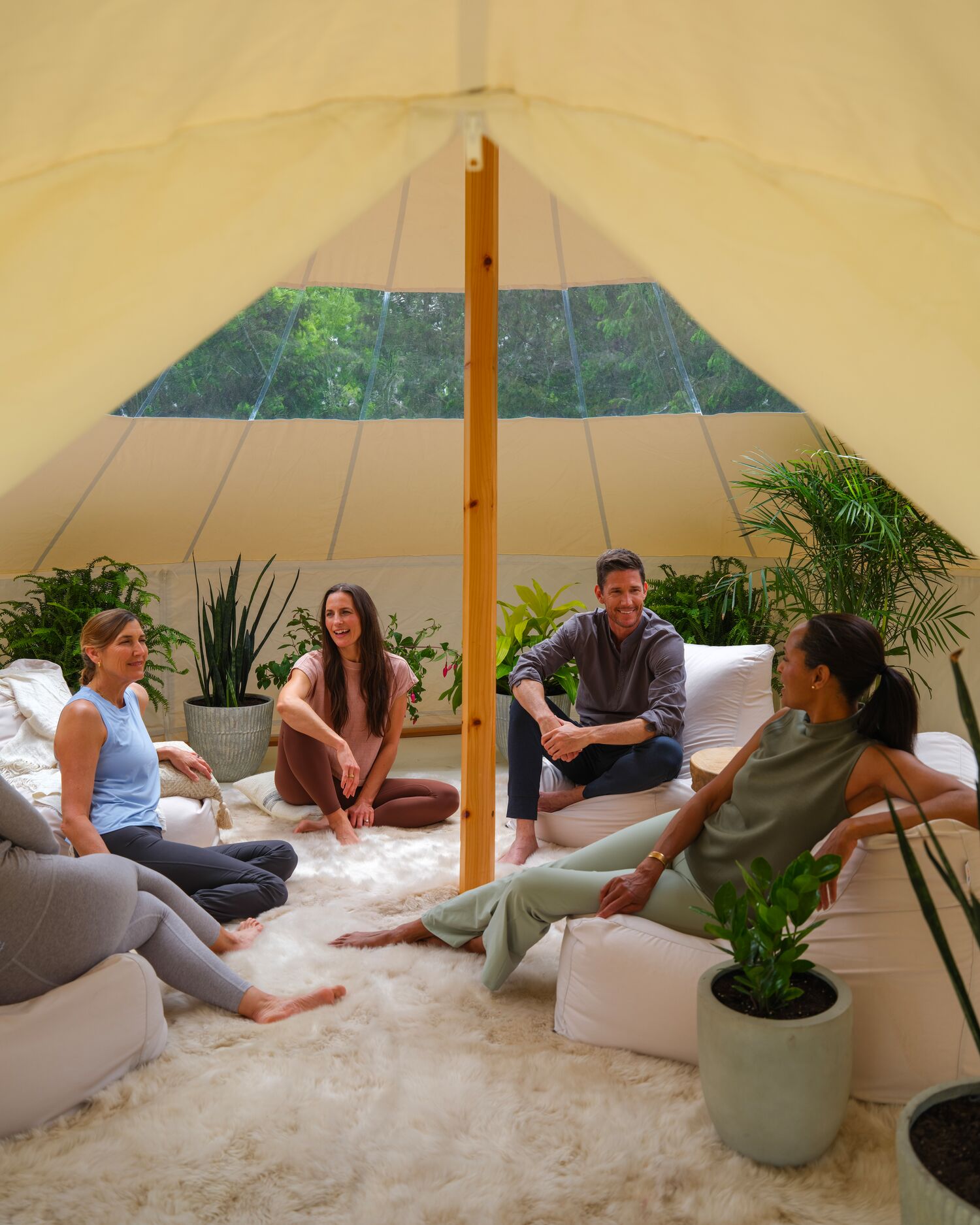 A group in the outdoor tents